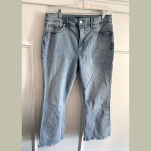 **SOLD** EXPRESS flare crop with embroidered leg.